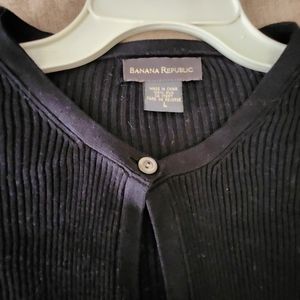 Jet black silk cardigan.